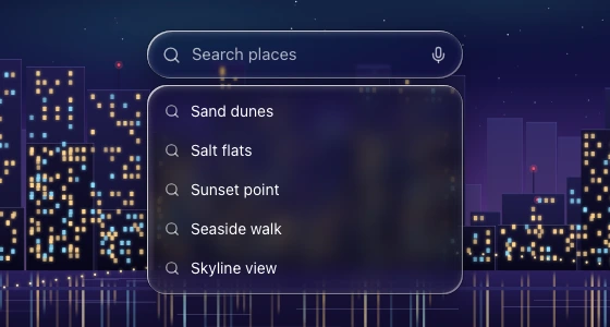 A capsule search field with a separate suggestion list below it, over a zoomed night skyline and its waterline.